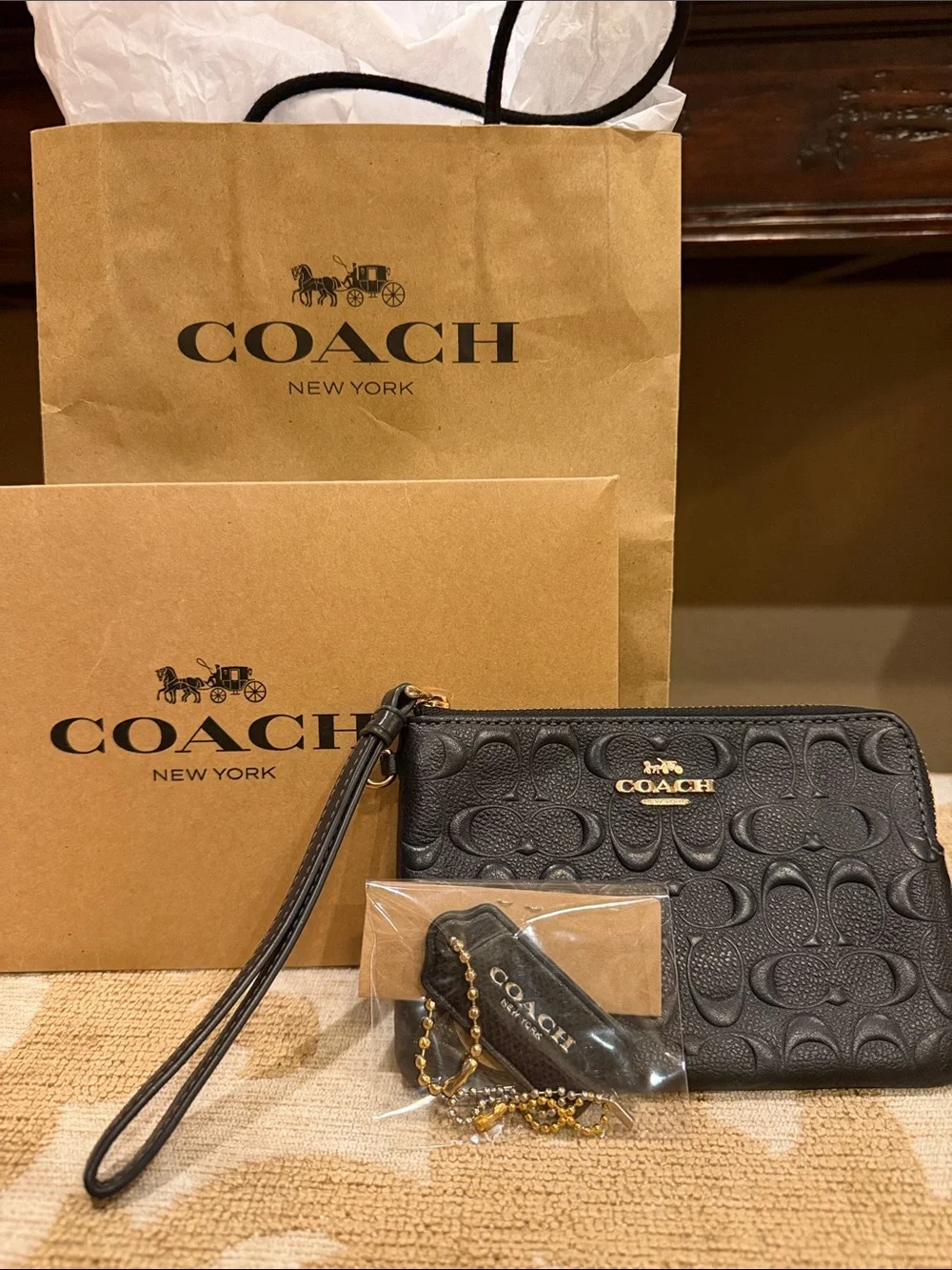 Coach Black Embossed Signature Leather Wristlet with Gold Logo